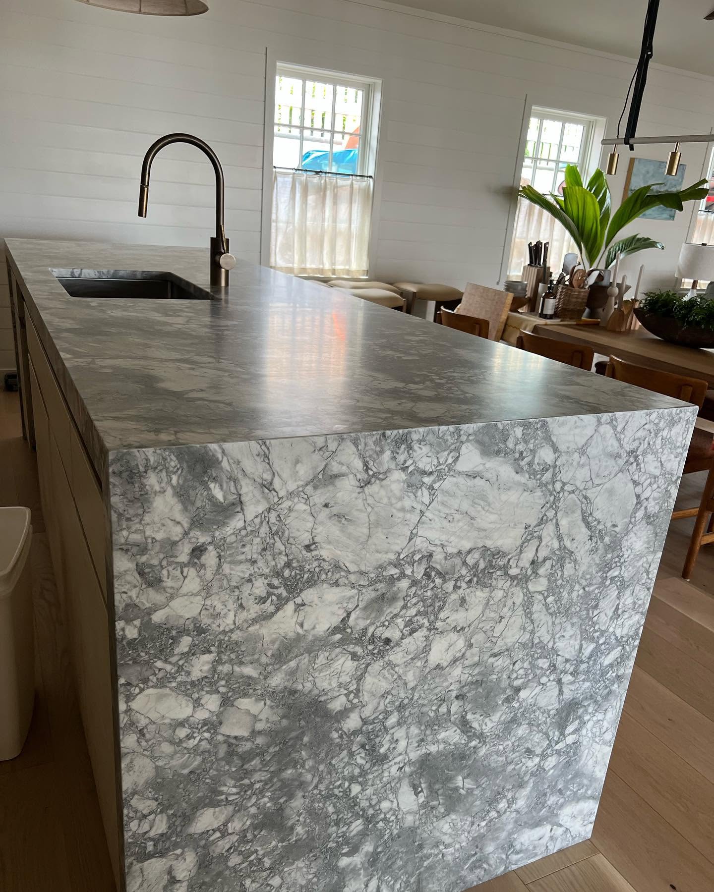 Stone kitchen island completed by RW Tile